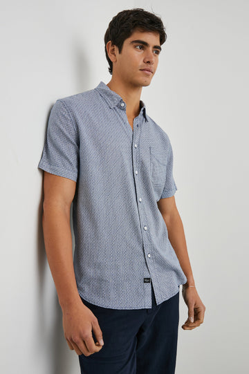 Carson Short Sleeve Button Up with a Chest Patch Pocket in Crown Jewel Sapphire Colorway, with a Small Diamond Pattern - Front View Featured on Model