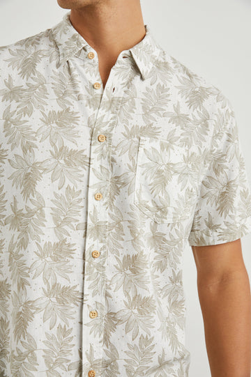 Carson Short Sleeve Button Up with a Chest Patch Pocket in Dotted Fronds Seneca Colorway, on White - Front View Featured on Model