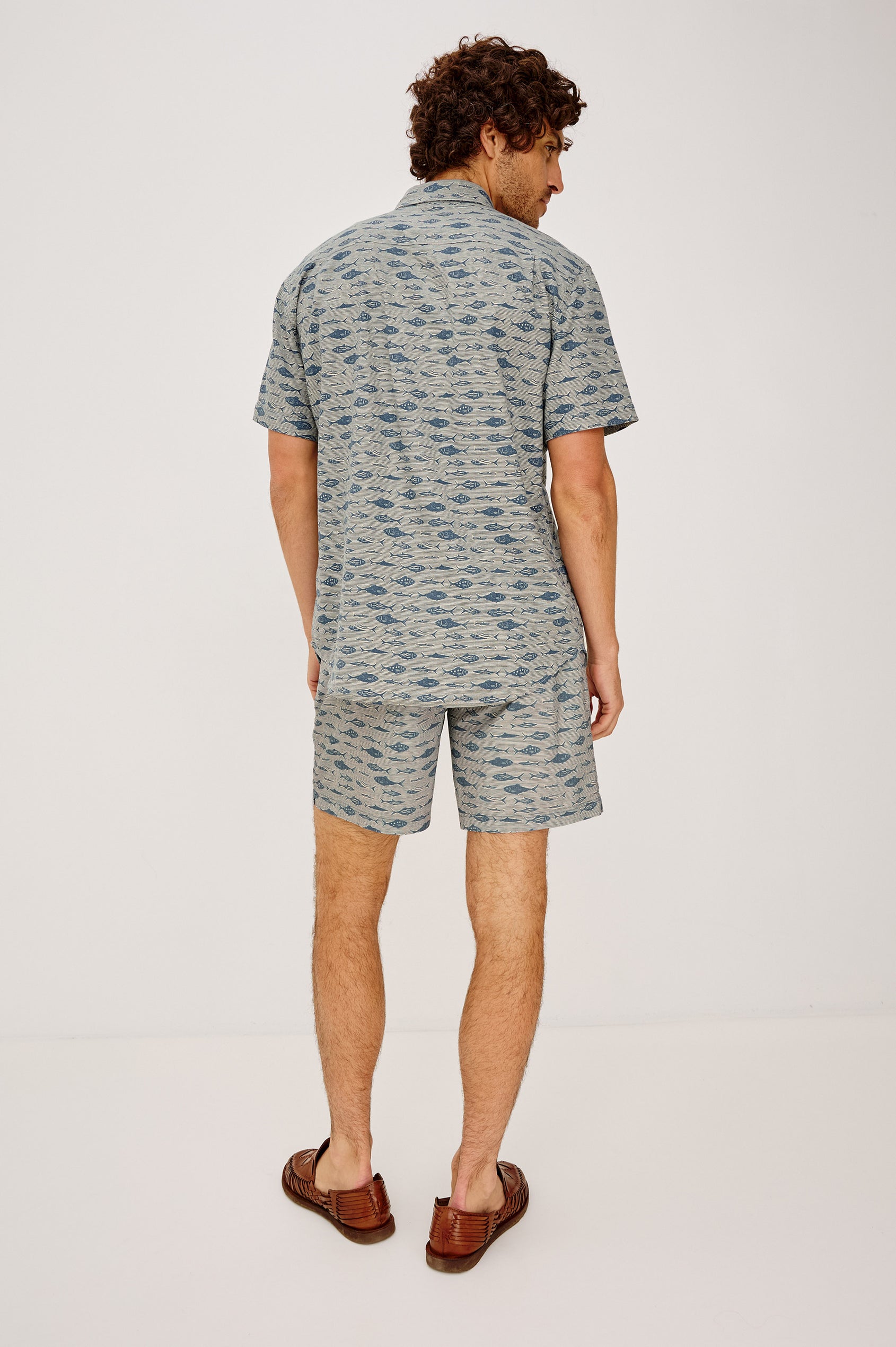 Dane Swim Short in Stretch Cotton Poly Blend With Drawstring Waist Ties, Relaxed Fit, Side Pockets, and Back Zip Welt Pocket in Vintage Aquarium Etch Colorway - Full Body Back View Featured on Model