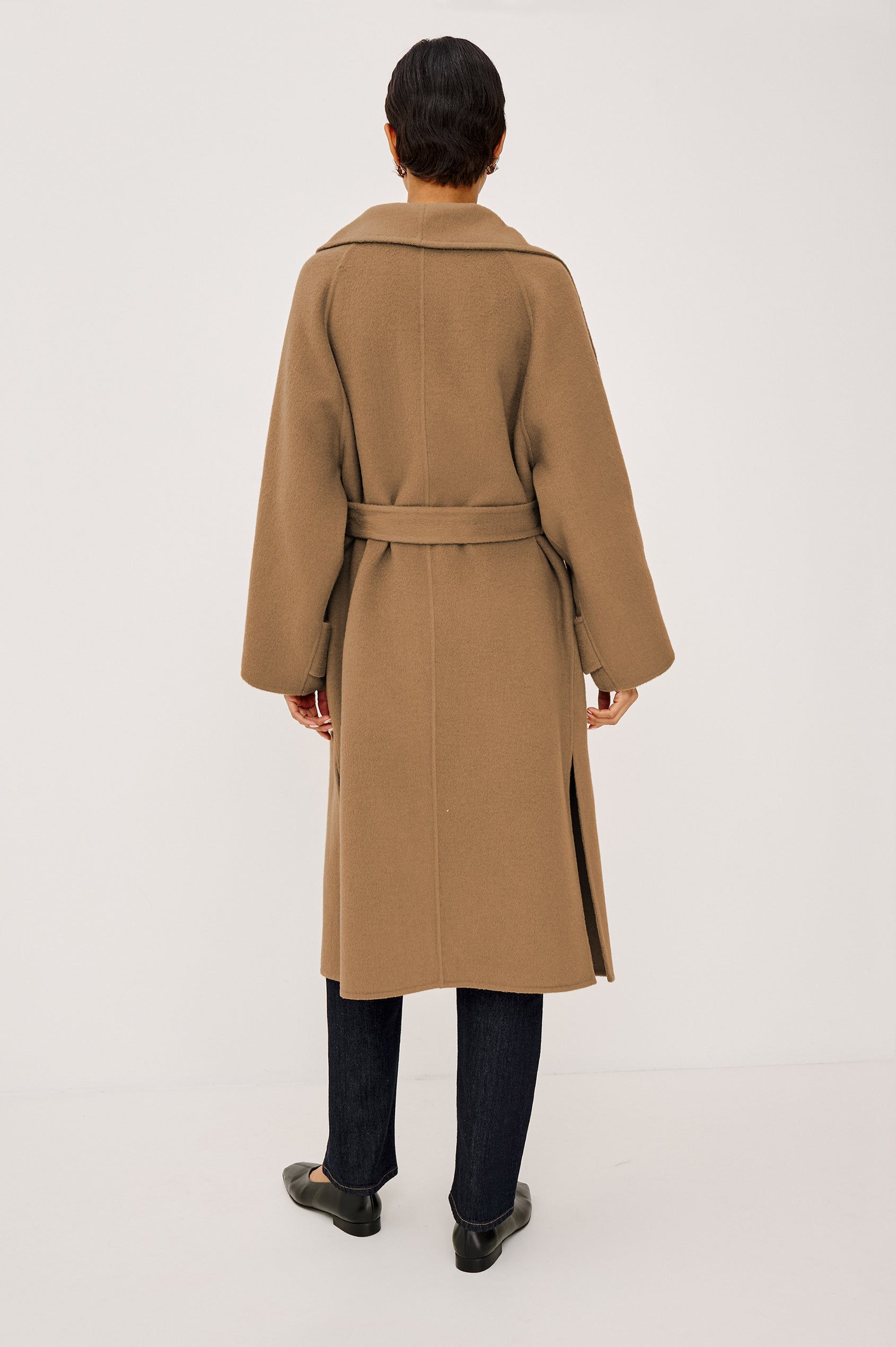 Celeste Coat in Heavy Wool Blend With Shawl Collar, Full Length, Self-Belted Waist, Side Pockets, Button-Tab Cuffs, and Half-Lined Interior in Camel Colorway - Full Body Back View Featured on Model