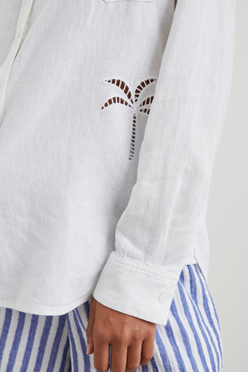 Charli Long-Sleeve Button up with a Chest Patch Pocket in White Palm Tree Eyelet Colorway, with eyelet Palm Trees on white - Front View Featured on Model
