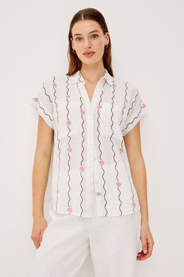 Cito Relaxed Button-Up Shirt in Linen With Collar Chest Patch Pockets and Cuffed Cap Sleeves in Striped Seashells Colorway - Upper Body Front View Featured on Model