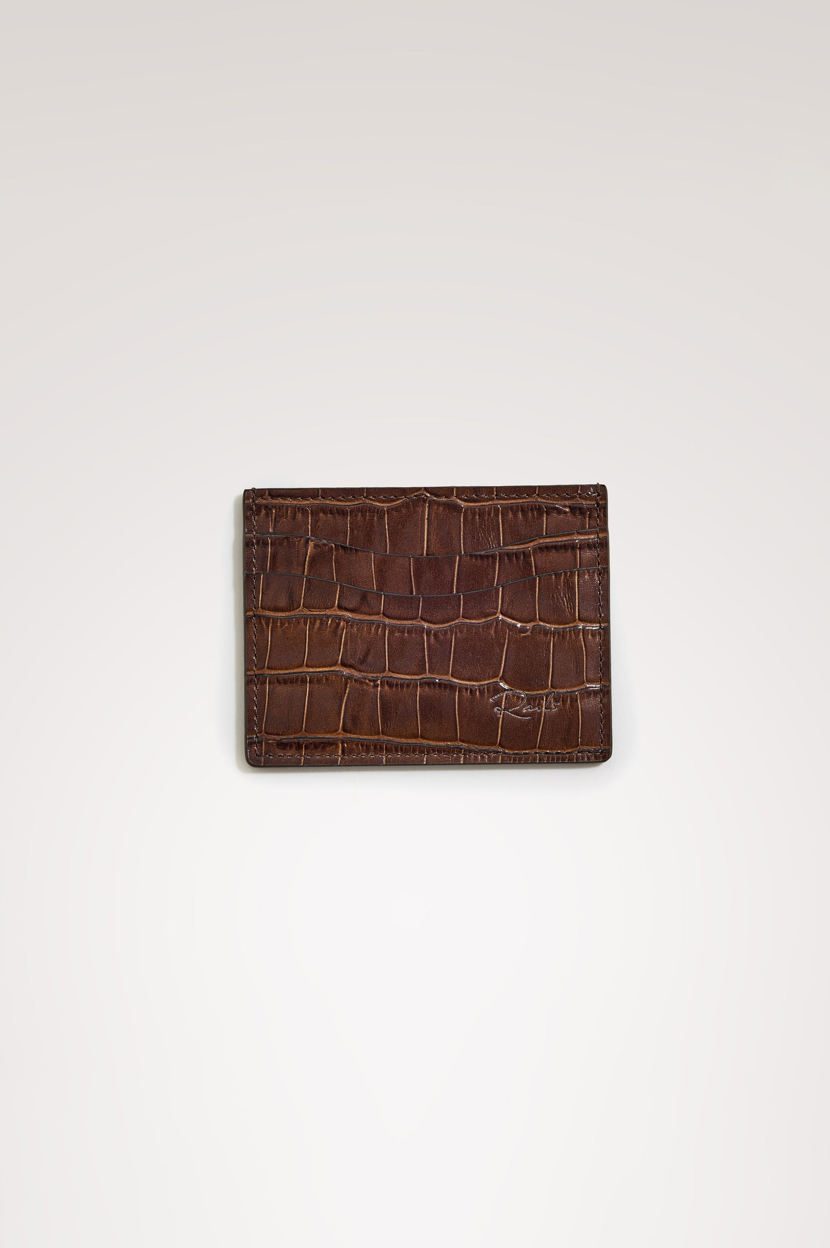Classic Card Holder in Croc-Embossed Spanish Leather With Top Pocket, Two Front Slip Pockets, and Embossed Rails Logo in Dark Brown Croc Embossed Colorway -