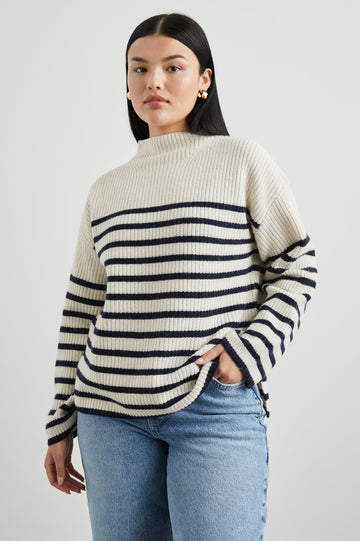 CLAUDIA-CREAM-NAVY-STRIPE-FRONT HAND IN POCKET MODEL 2