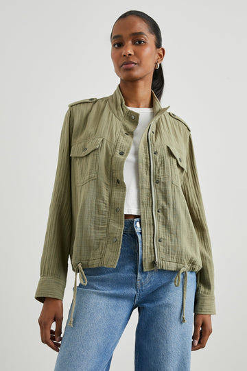 Collins Jacket with Zip and Snap Closure, Two Chest Snap Flap Pockets, Toggle Drawstring Hem, Snap Shoulder Straps and a Breathable Back Flap in Gauze Mermaid Colorway - Front View Featured on Model