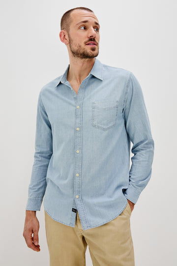 Colton Long-Sleeve Denim Button Up with a Chest Patch Pocket in Medium Vintage Wash Colorway - Front View Featured on Model 