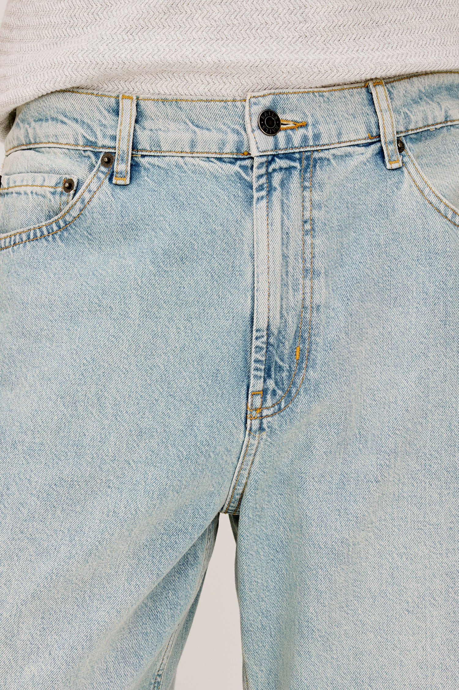 Cutler 90's Loose Jeans with Belt Loops, Two Front Pockets plus a Coin Pocket and Two Back Patch Pockets in Vintage Light Wash Colorway - Front View Featured on Model