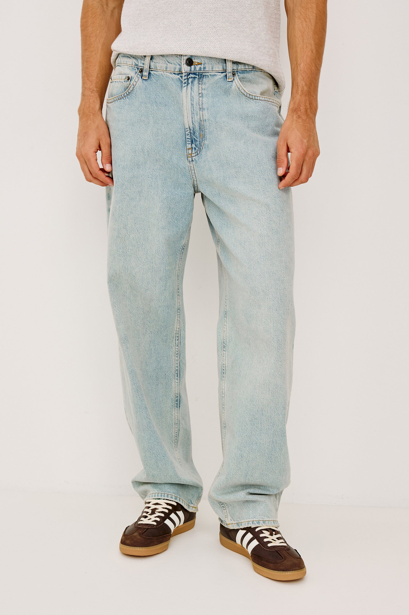 Cutler 90's Loose Jeans with Belt Loops, Two Front Pockets plus a Coin Pocket and Two Back Patch Pockets in Vintage Light Wash Colorway - Full Body View Featured on Model