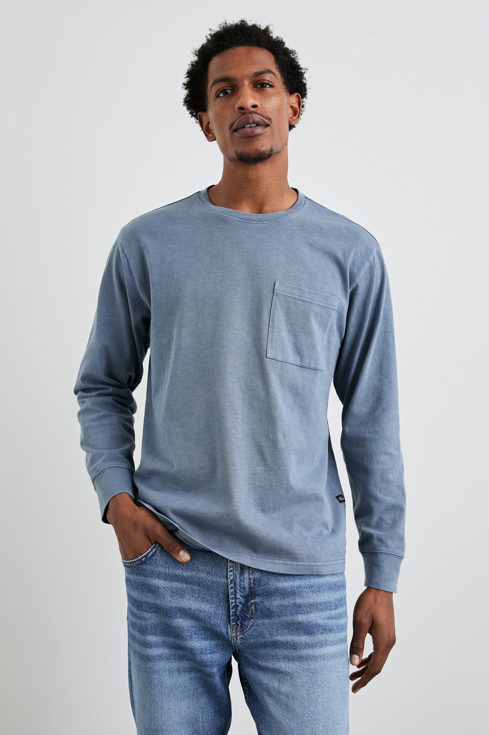 Cyd Long Sleeve Crew Neck T-Shirt  with a Chest Patch Pocket in Steel Colorway - Front View Featured on Model