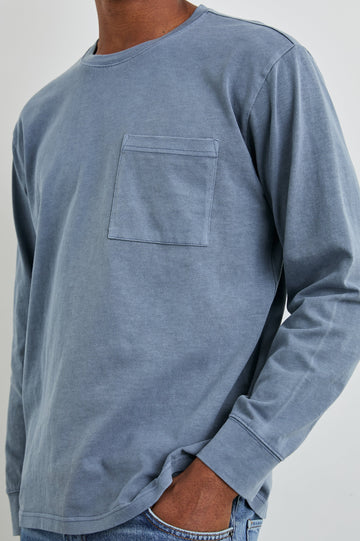 Cyd Long Sleeve Crew Neck T-Shirt  with a Chest Patch Pocket in Steel Colorway - Front View Featured on Model
