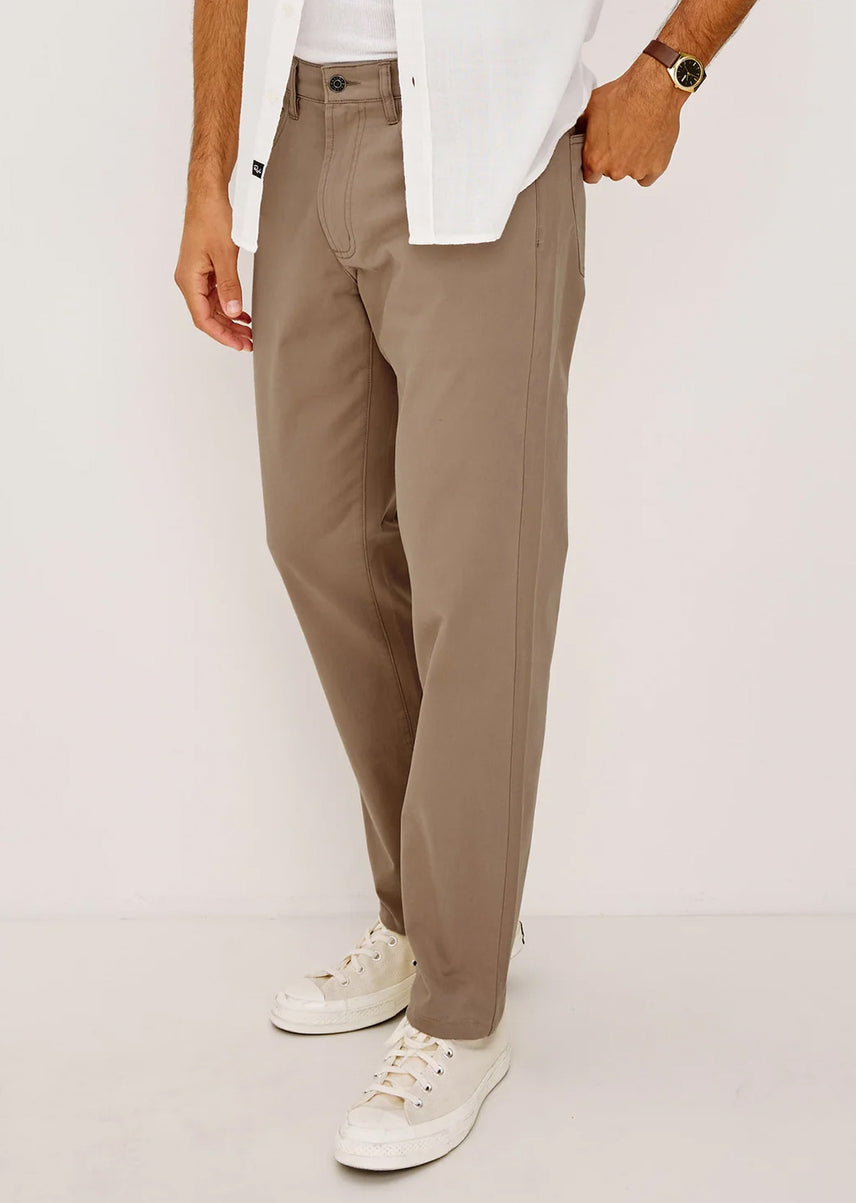 Man wearing a brown neutral pair of pants