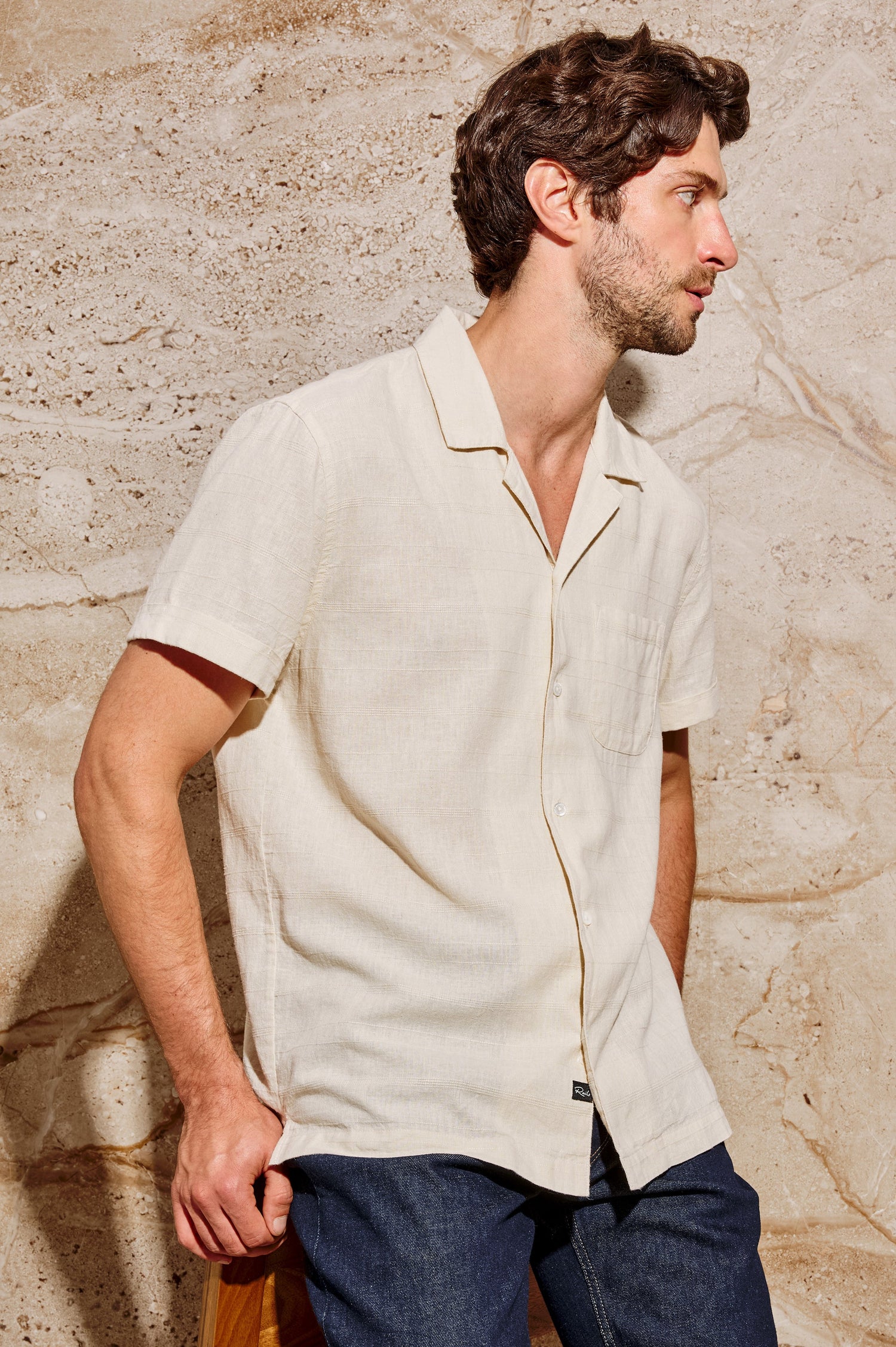 Davis Short Sleeve Button Up with a Chest Patch Pocket, Rolled Cuffs and Textured Horizontal Stripes in Nougat Colorway - Front View Featured on Model