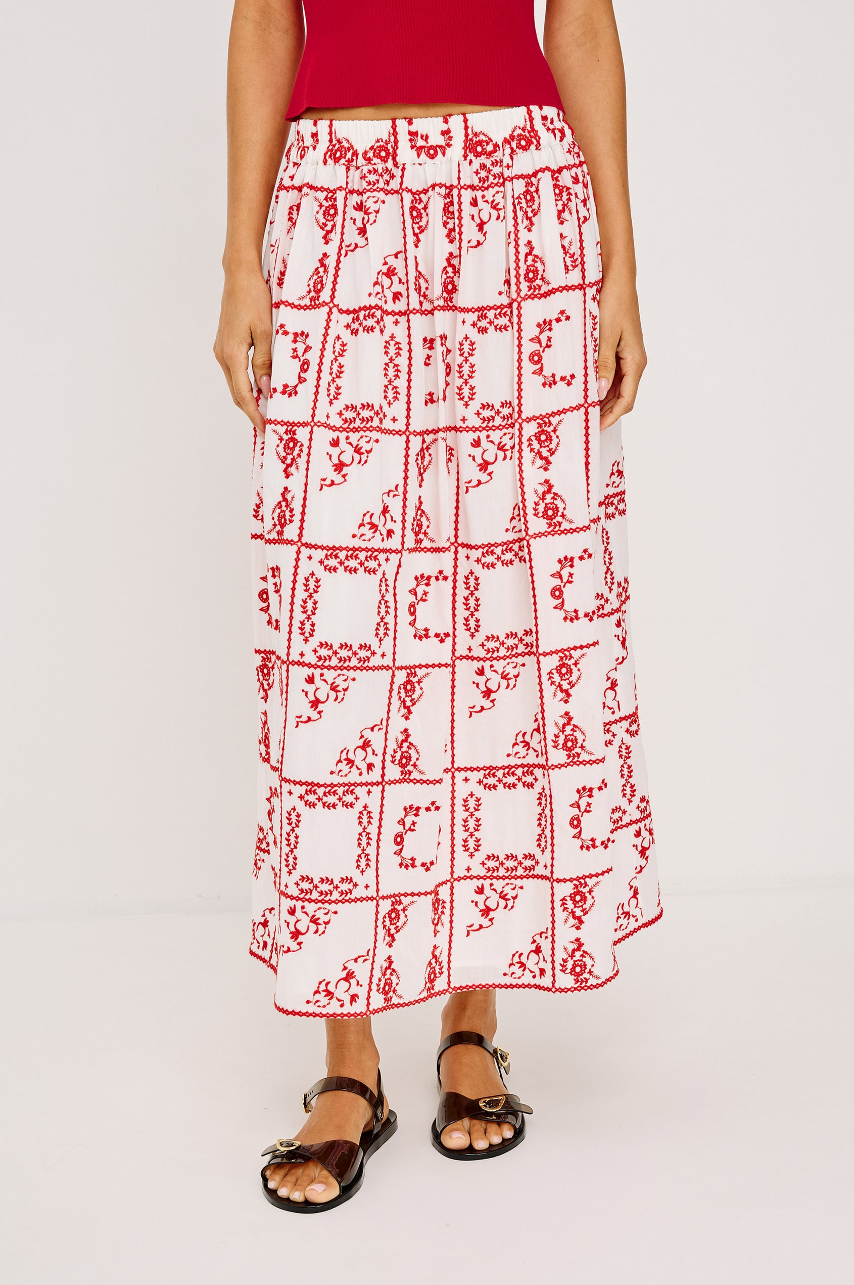 Dax Maxi Skirt With Elastic Waistband, A-Line Silhouette, and is Fully Lined in Red Handkerchief Colorway - Lower Body Front View Featured on Model