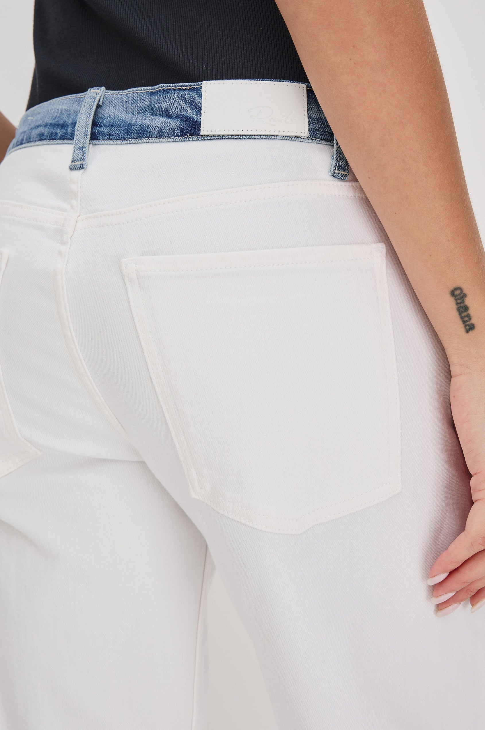 Del Mar low slung baggy boyfriend 5-pocket jean in contrast white and medium wash - Skipper White. Back detail view on model.