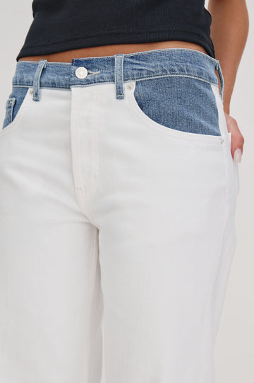 Del Mar low slung baggy boyfriend 5-pocket jean in contrast white and medium wash - Skipper White. Front  detail view on model.