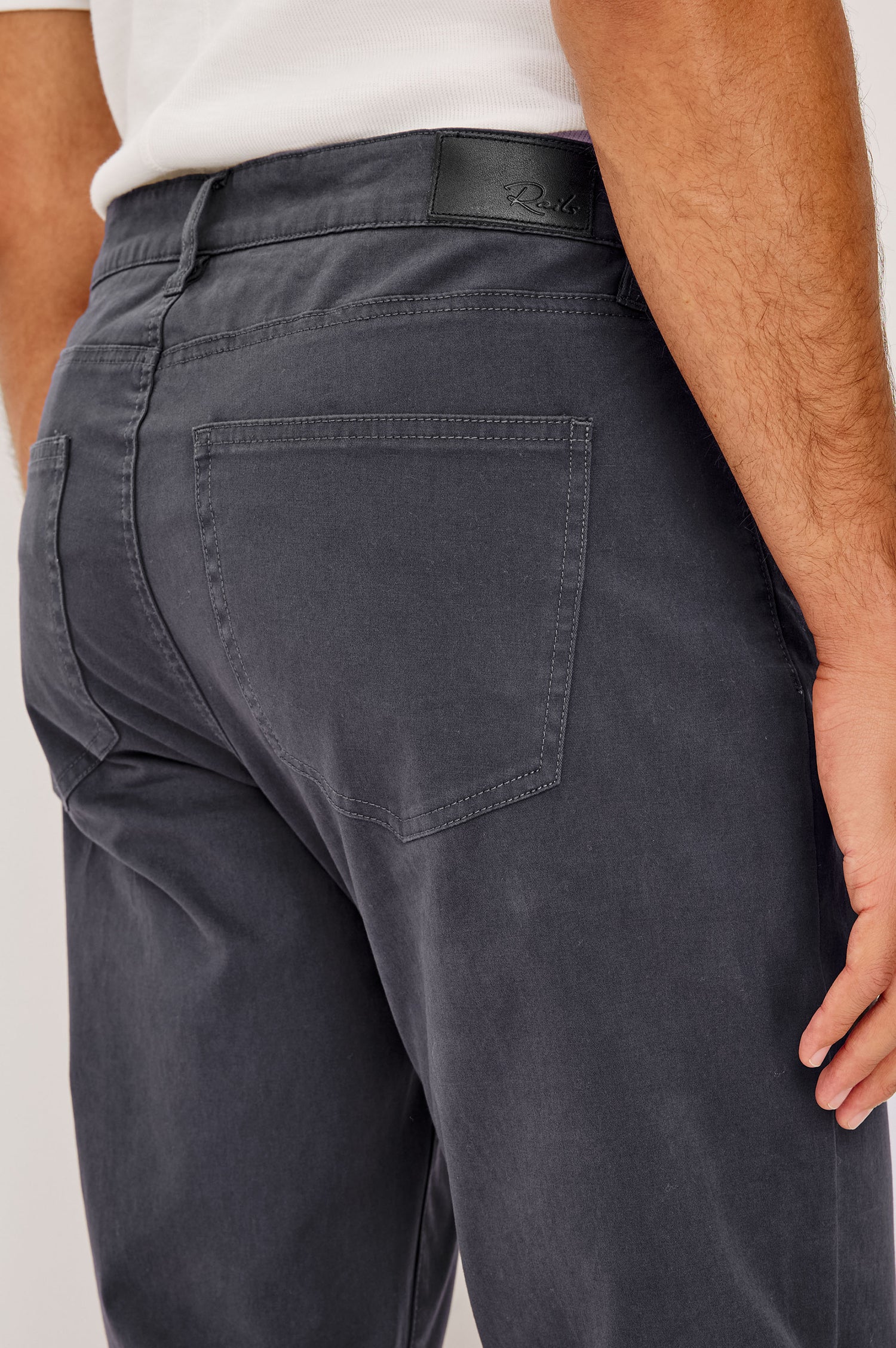 Dempsey Slim Straight Pant in Cotton Stretch With Front Zip Fly, 5-Pockets, and Belt Loops in Faded Grey Colorway - Lower Body Back View Featured on Model