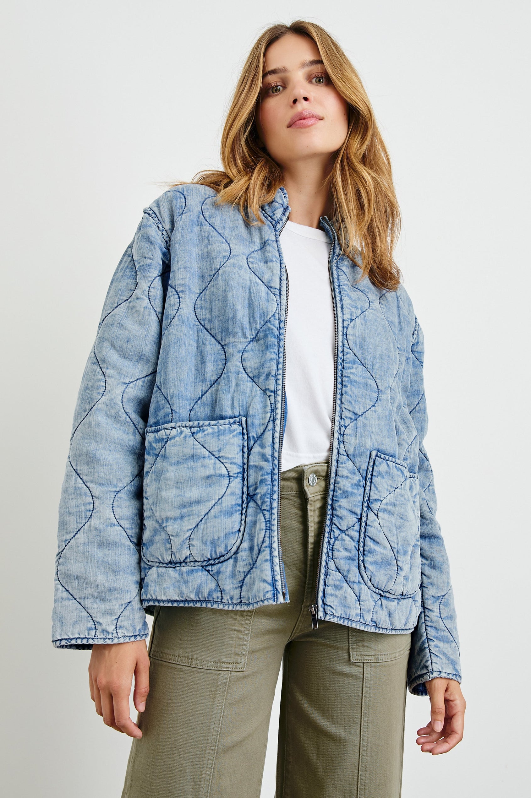 Denver Jacket with a Zip Up Closure, Two Front Patch Pockets and Quilted Stitching in Med Vintage Cloud Wash Colorway - Front View Featured on Model