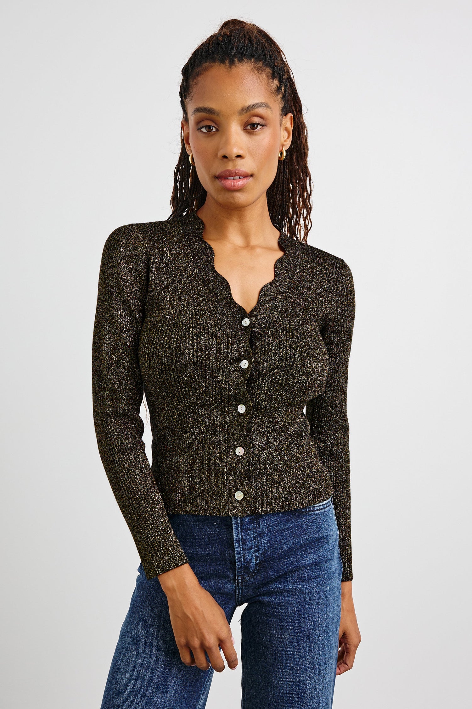 Dita Long-Sleeve Cardigan with Button Closure, a V neck and Scalloped Trim along the Neckline and Closure in Gold Lurex Colorway - Front View Featured on Model