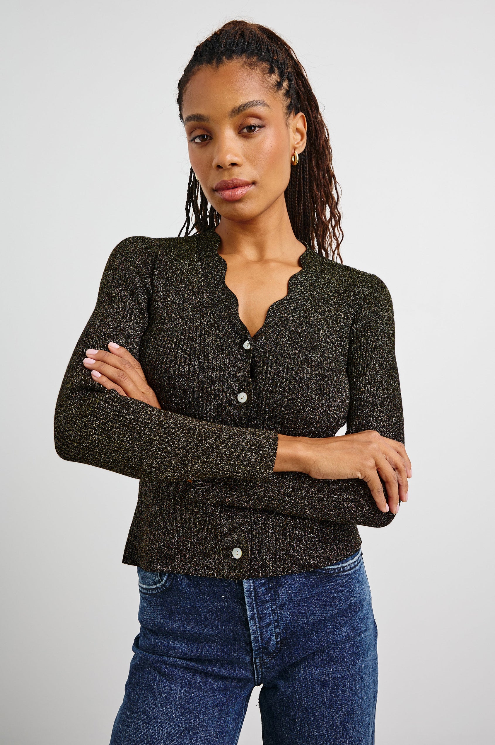 Dita Long-Sleeve Cardigan with Button Closure, a V neck and Scalloped Trim along the Neckline and Closure in Gold Lurex Colorway - Front View Featured on Model