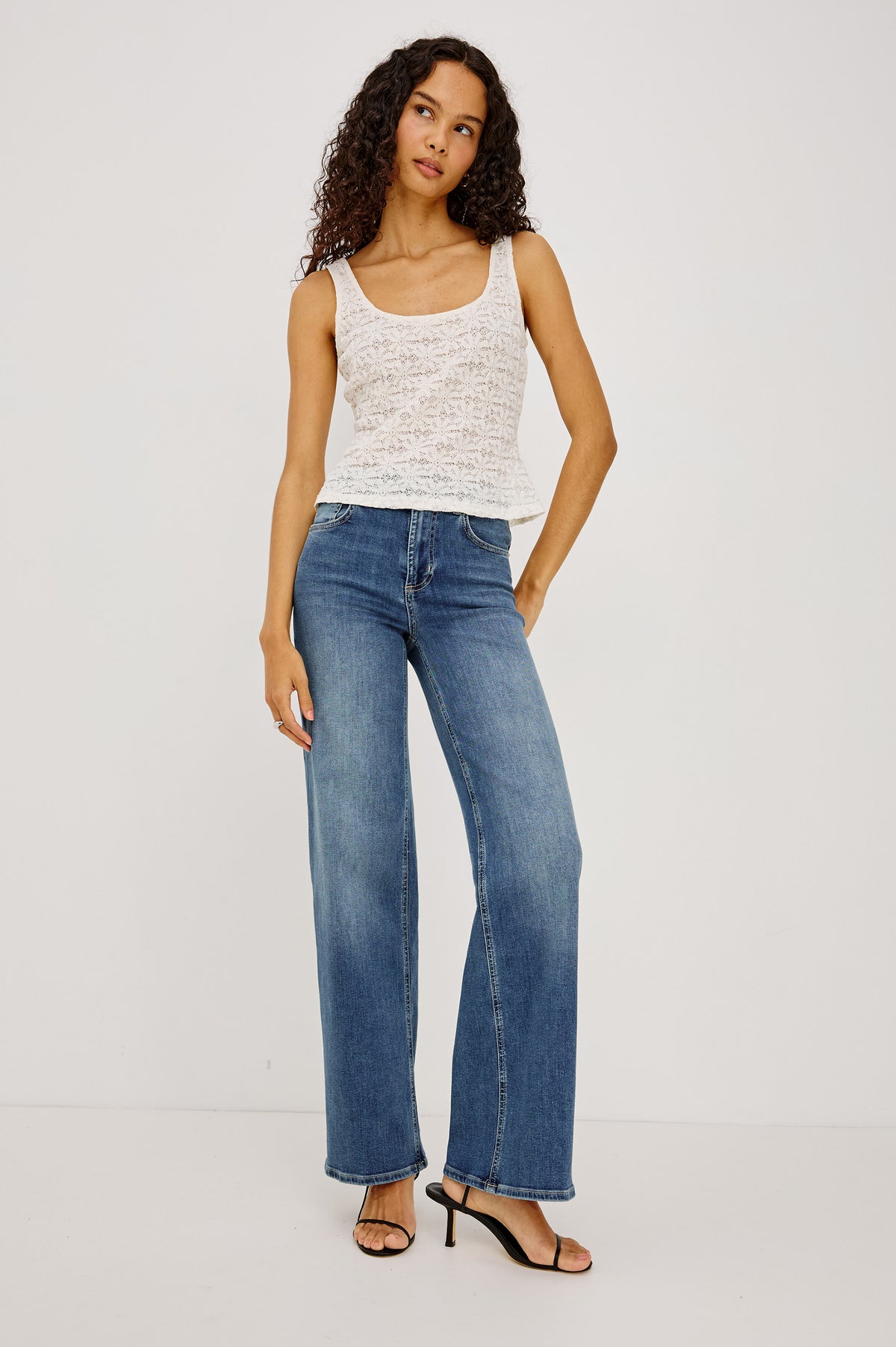 Donya Top in Sheer Stretch Mesh With Scoop Neckline, Tank-Style Shoulder Straps, and Sleeveless Cut in Ivory Colorway - Full Body Front View Featured on Model
