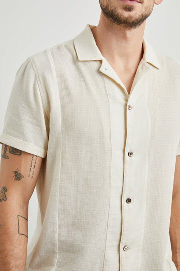 Duke Short Sleeve Button Up with Rolled Cuffs and in Parchment Wheat Colorway, Alternating Vertical Panels of Wheat and Parchment - Front View Featured on Model