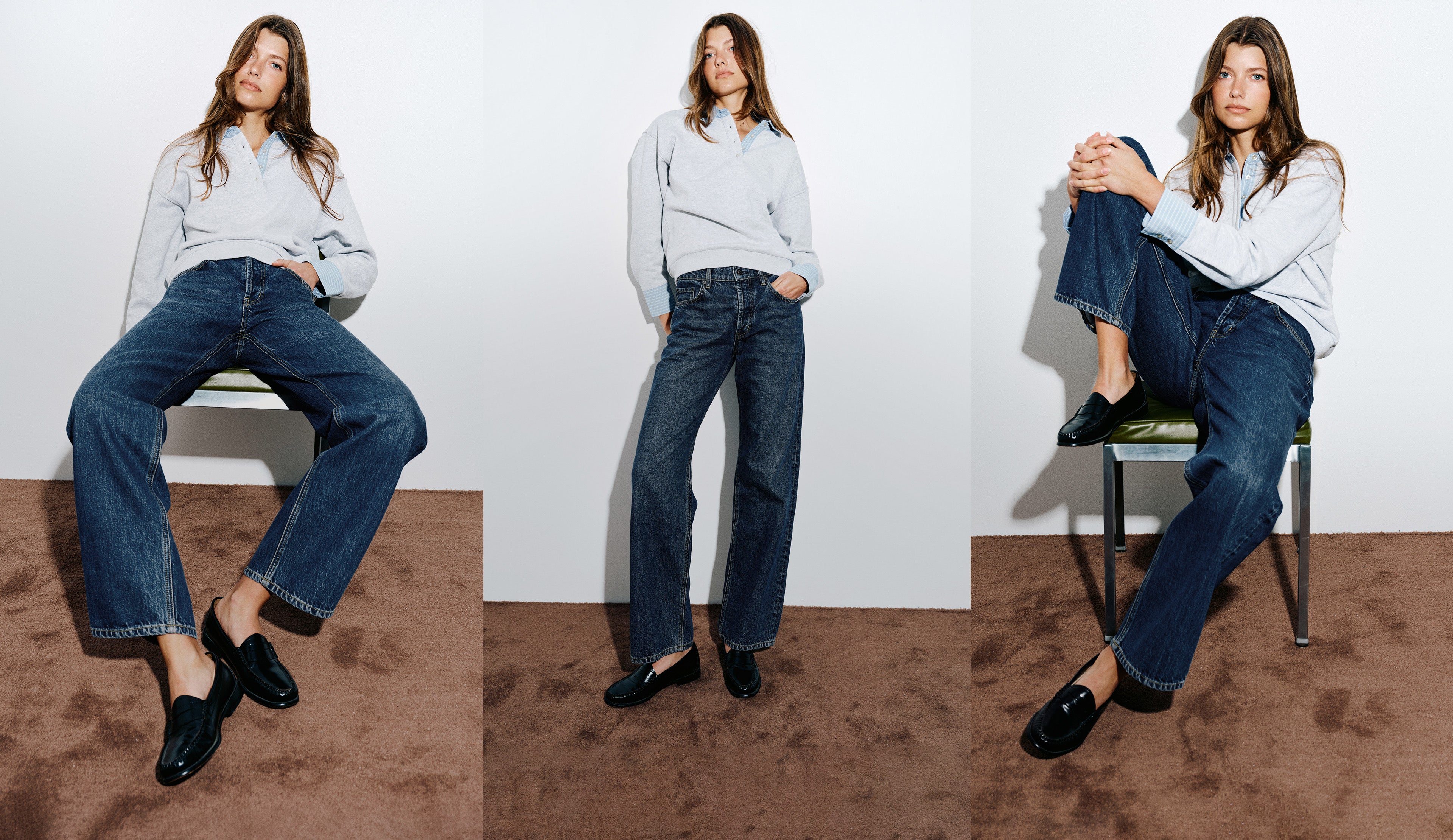 Three-panel lifestyle photo of a woman modeling dark blue wide-leg jeans with a light gray long-sleeve shirt and black loafers, posed against a white wall with a brown carpeted floor.