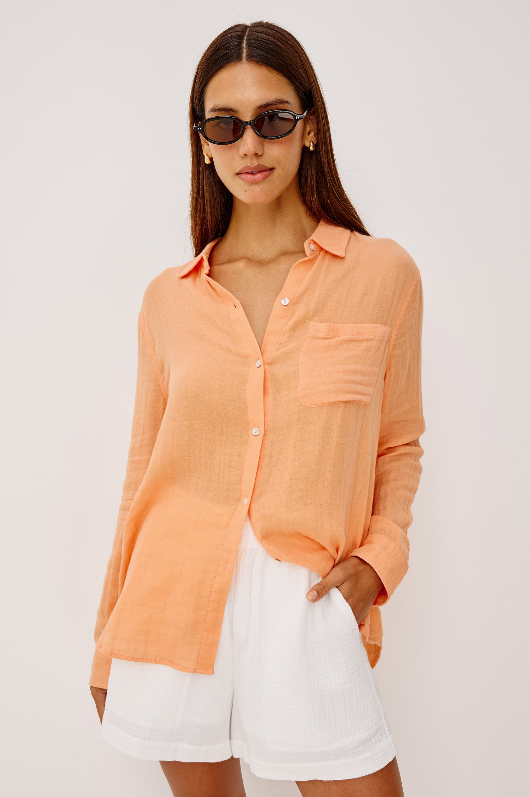 Ellis Button-Up Shirt in Cotton Gauze With Relaxed Fit, Chest Patch Pocket, and Long Sleeves in Papaya Colorway - Upper Body Front View Featured on Model