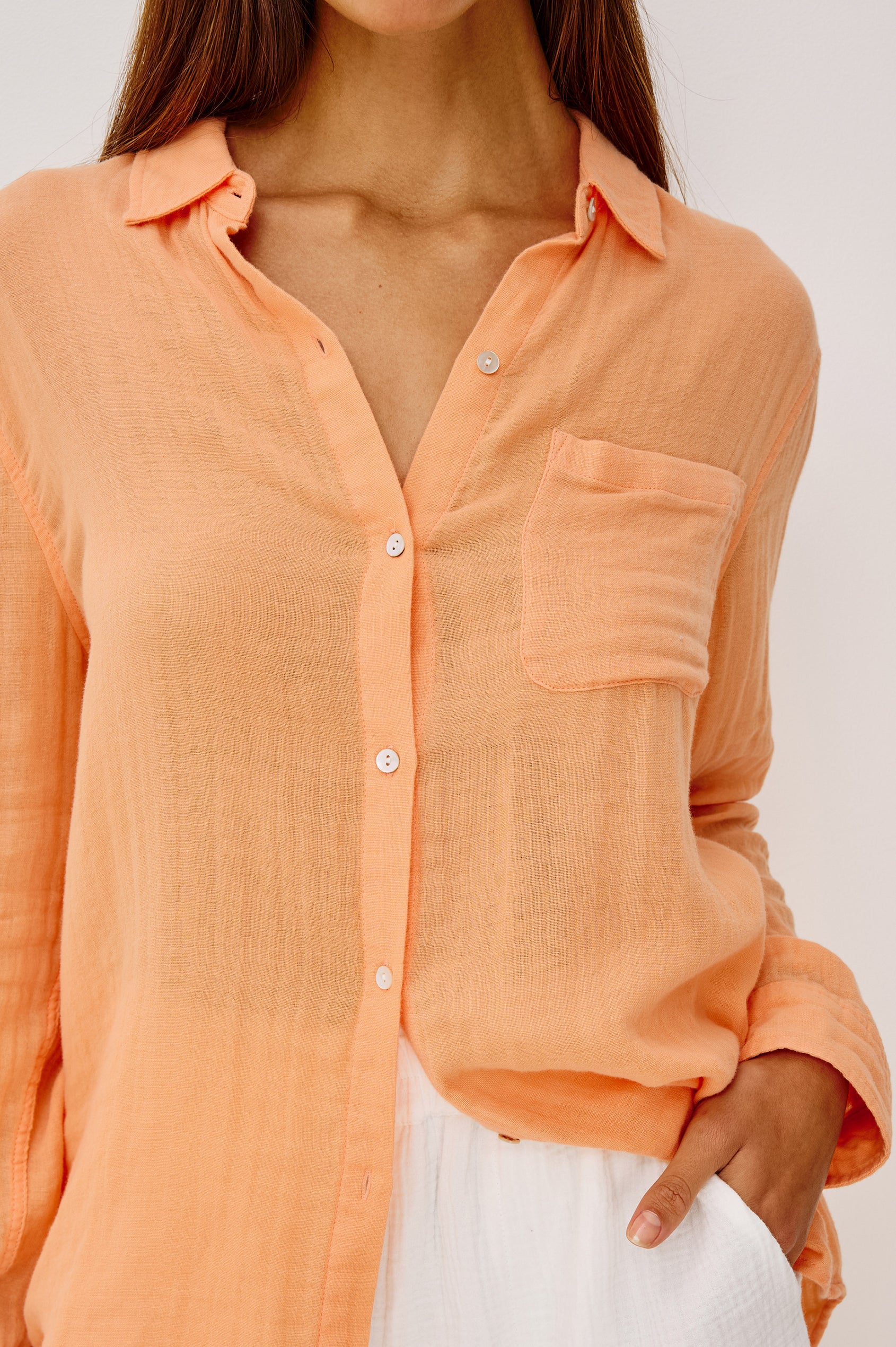 Ellis Button-Up Shirt in Cotton Gauze With Relaxed Fit, Chest Patch Pocket, and Long Sleeves in Papaya Colorway - Upper Body Front View Featured on Model