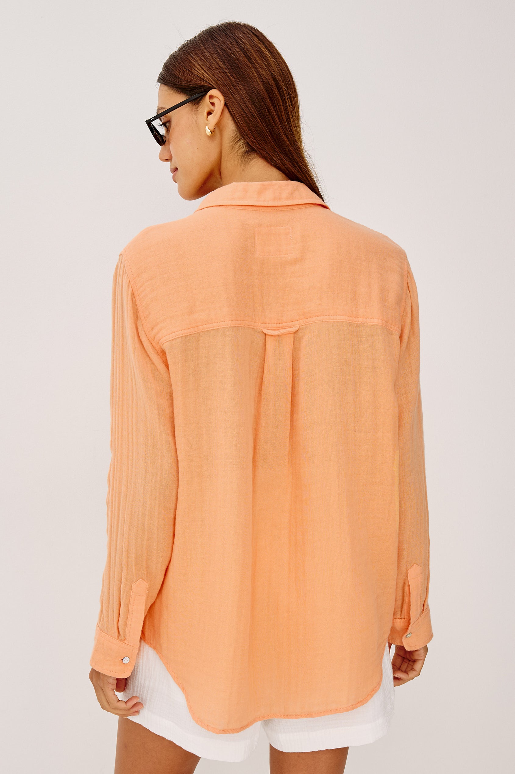 Ellis Button-Up Shirt in Cotton Gauze With Relaxed Fit, Chest Patch Pocket, and Long Sleeves in Papaya Colorway - Upper Body Back View Featured on Model