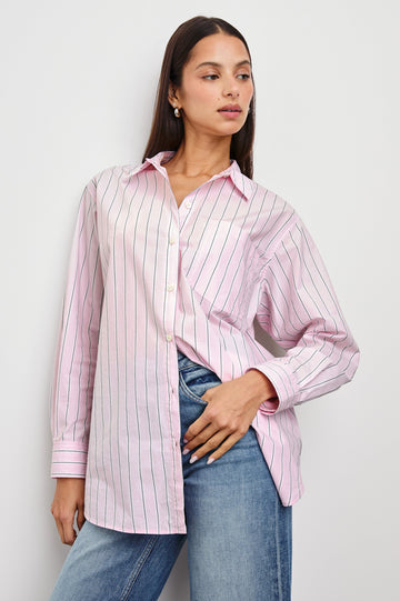 Elsa Long-Sleeve Button Down Shirt with Chest Patch Pocket in Cherry Blossom Stripe Colorway, Thin Black and White Vertical Stripes on Pink- Front Untucked View Featured on Model