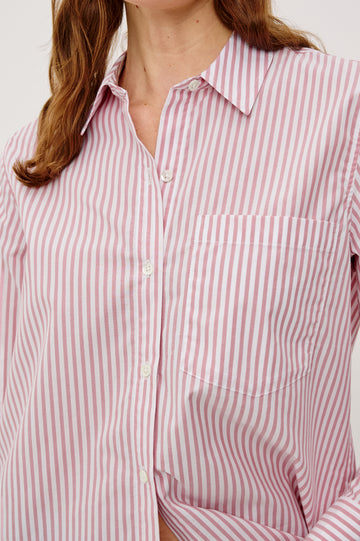 Elsa Button-Up Shirt in Cotton Poplin With Relaxed Oversized Fit Classic Chest Pocket Long Sleeves and Curved Hem in Rose Stripe Colorway - Upper Body Close Up View Featured on Model