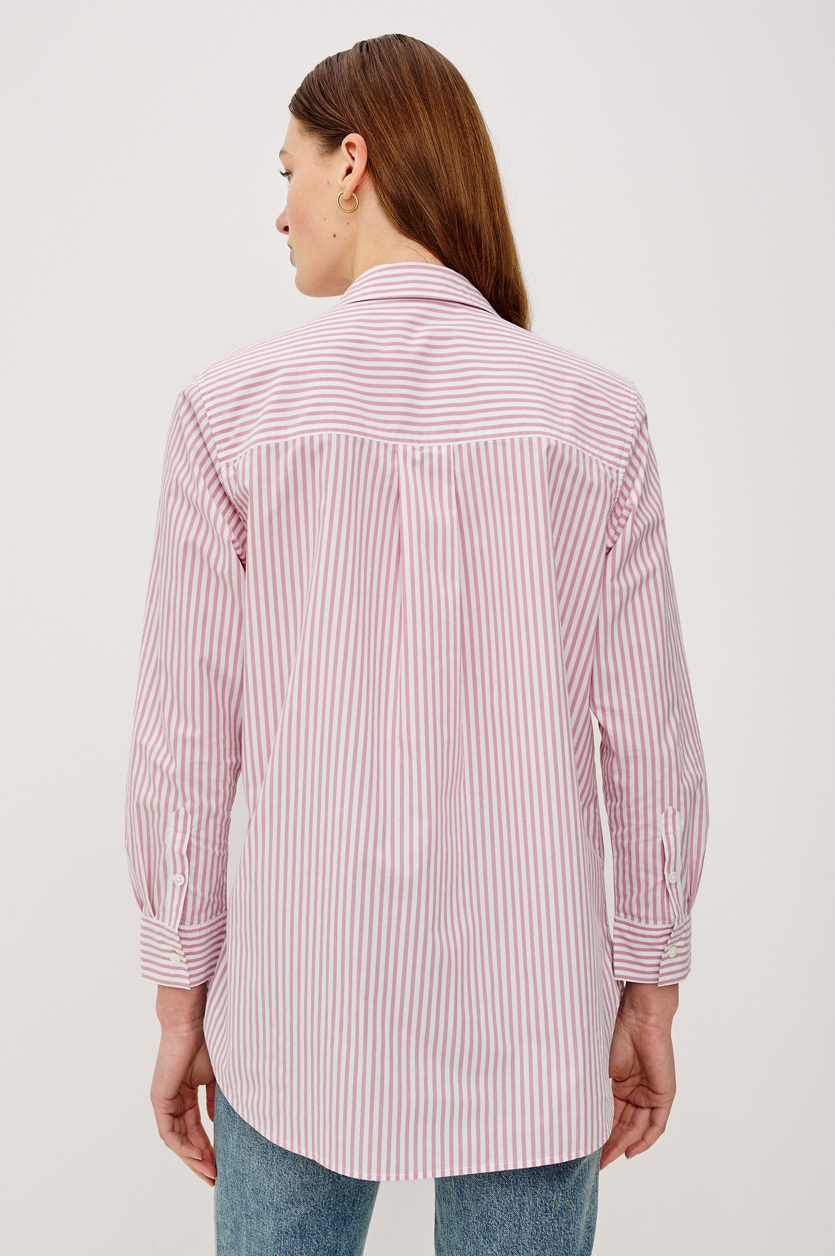 Elsa Button-Up Shirt in Cotton Poplin With Relaxed Oversized Fit Classic Chest Pocket Long Sleeves and Curved Hem in Rose Stripe Colorway - Upper Body Back View Featured on Model