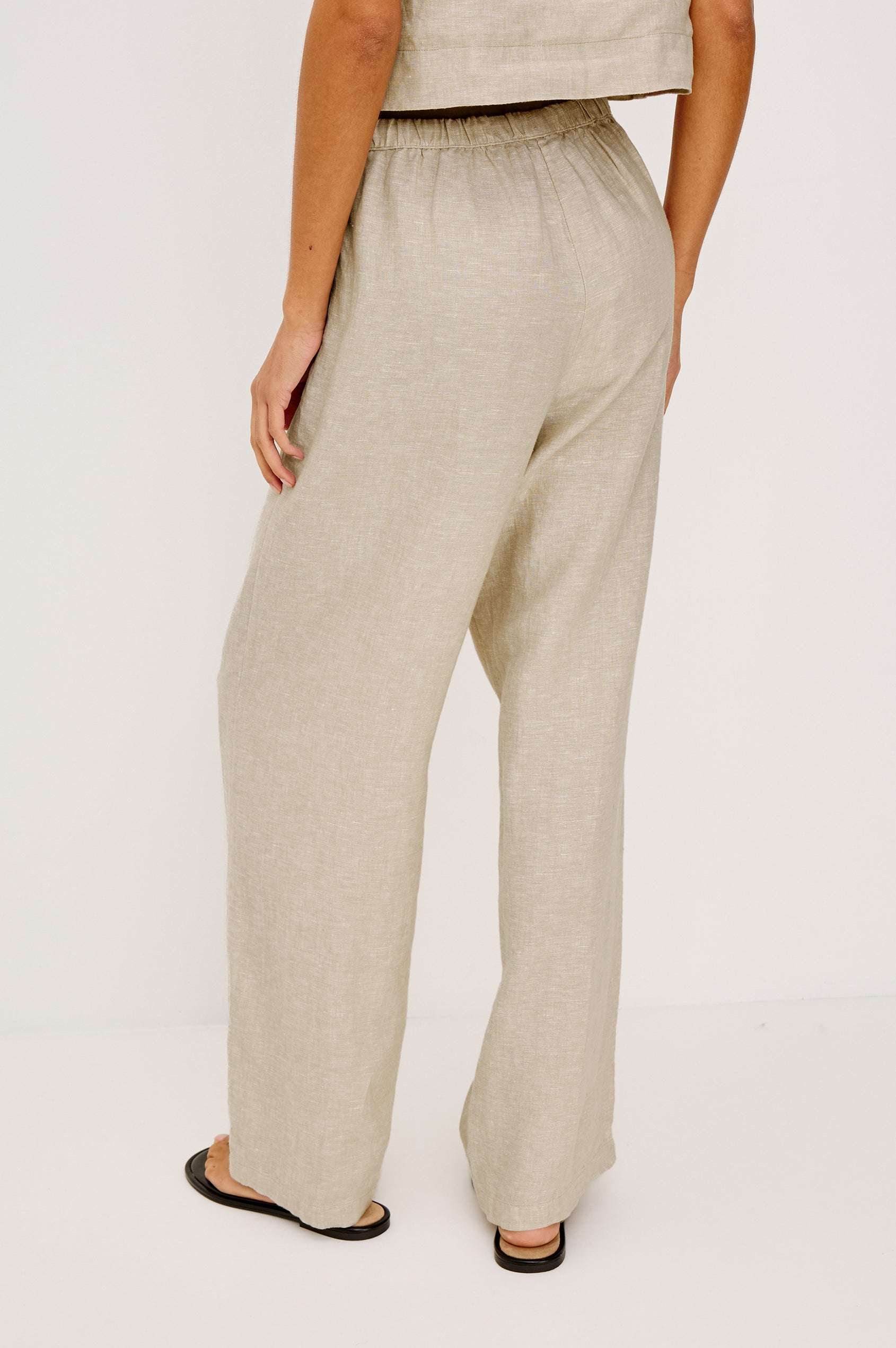 Emmie high rise linen wide leg pant with drawstring in Heathered Flax Colorway - Lower Body Back View Shown on Model.