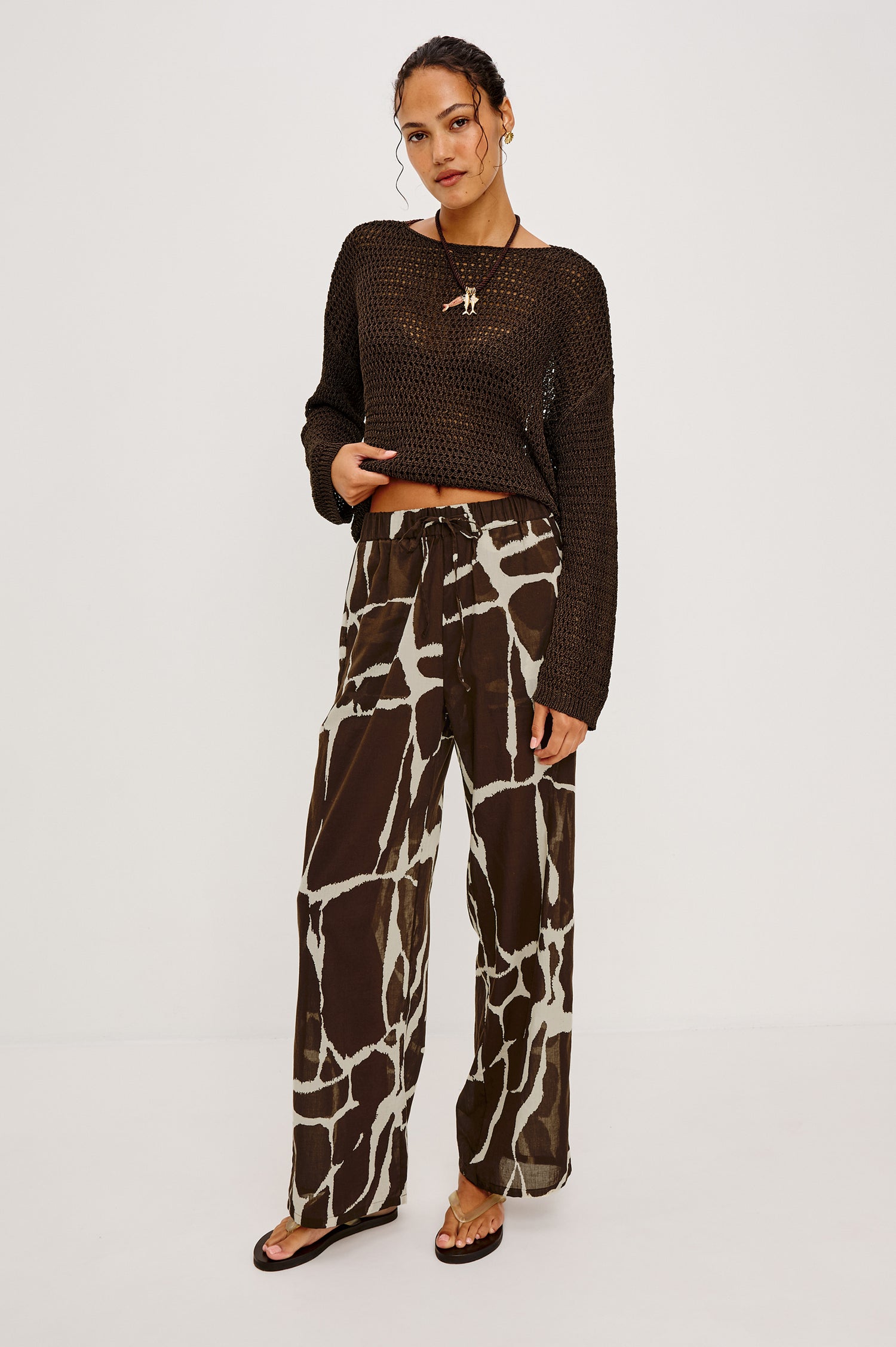 Emmie High-Waisted Wide-Leg Pant in Unlined Beach Cotton With Relaxed Fit Side Pockets and Adjustable Drawstring Waist Ties in Terra Colorway - Full Body Front View Featured on Model