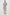 Erica Lightweight Denim Mini Dress with a Exposed Button Front, Encased Drawstring Waistband, Front Patch Pockets, Chest Pockets, Sleeveless and Collared in Faded Indigo Colorway. Full Body Front View Shown on Model.