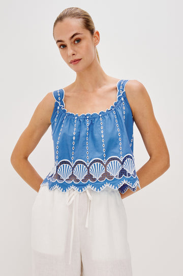 Esperanza Scoop Neck Tank Top with Sea Shell Embroidery and Scalloped Hems in French Blue Colorway. Front View Shown on Model.