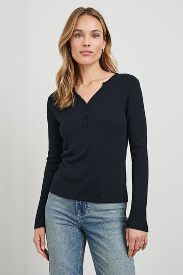 Essential Long-Sleeve Finely Ribbed Henley, with a V Neck and a Placket with Buttons in Black Colorway - Front View Featured on Model 