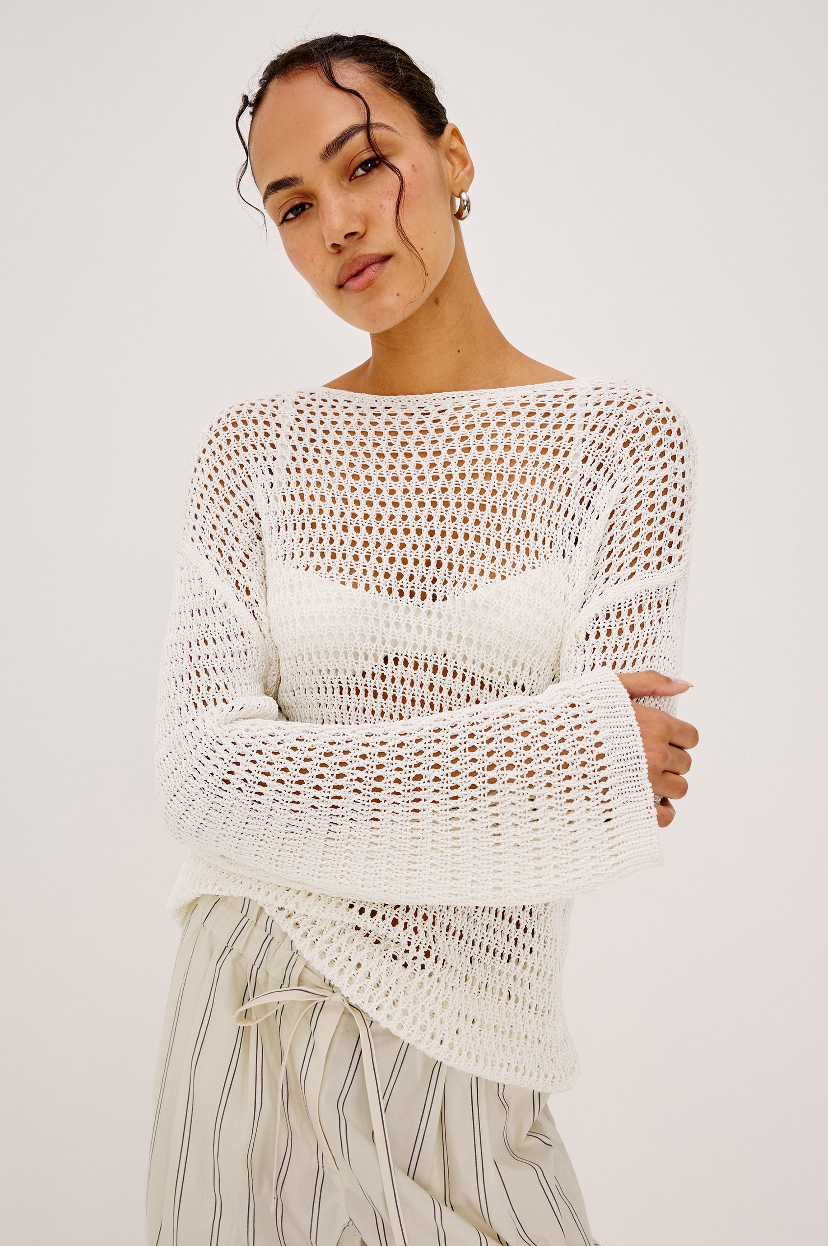 Evangeline Open Knit Oversized Sweater With Dropped Shoulders and Long Sleeves in Ivory Colorway - Upper Body Front View Featured on Model