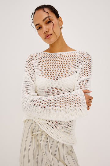 Evangeline Open Knit Oversized Sweater With Dropped Shoulders and Long Sleeves in Ivory Colorway - Upper Body Front View Featured on Model