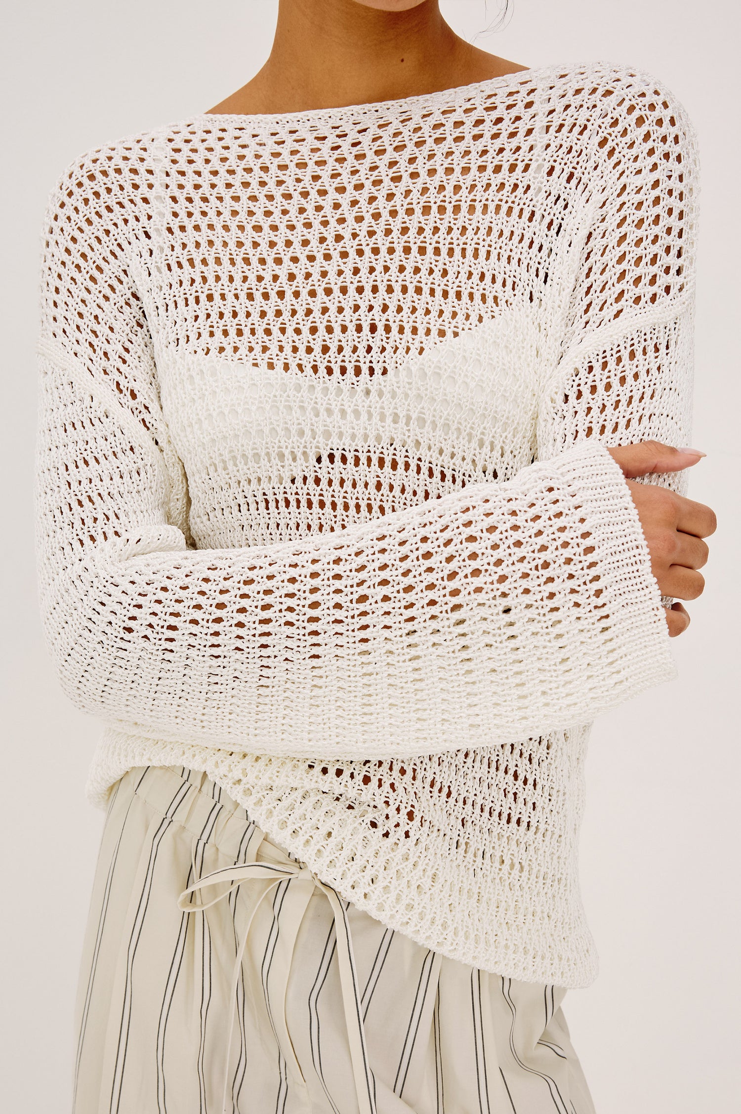 Evangeline Open Knit Oversized Sweater With Dropped Shoulders and Long Sleeves in Ivory Colorway - Upper Body Front View Featured on Model