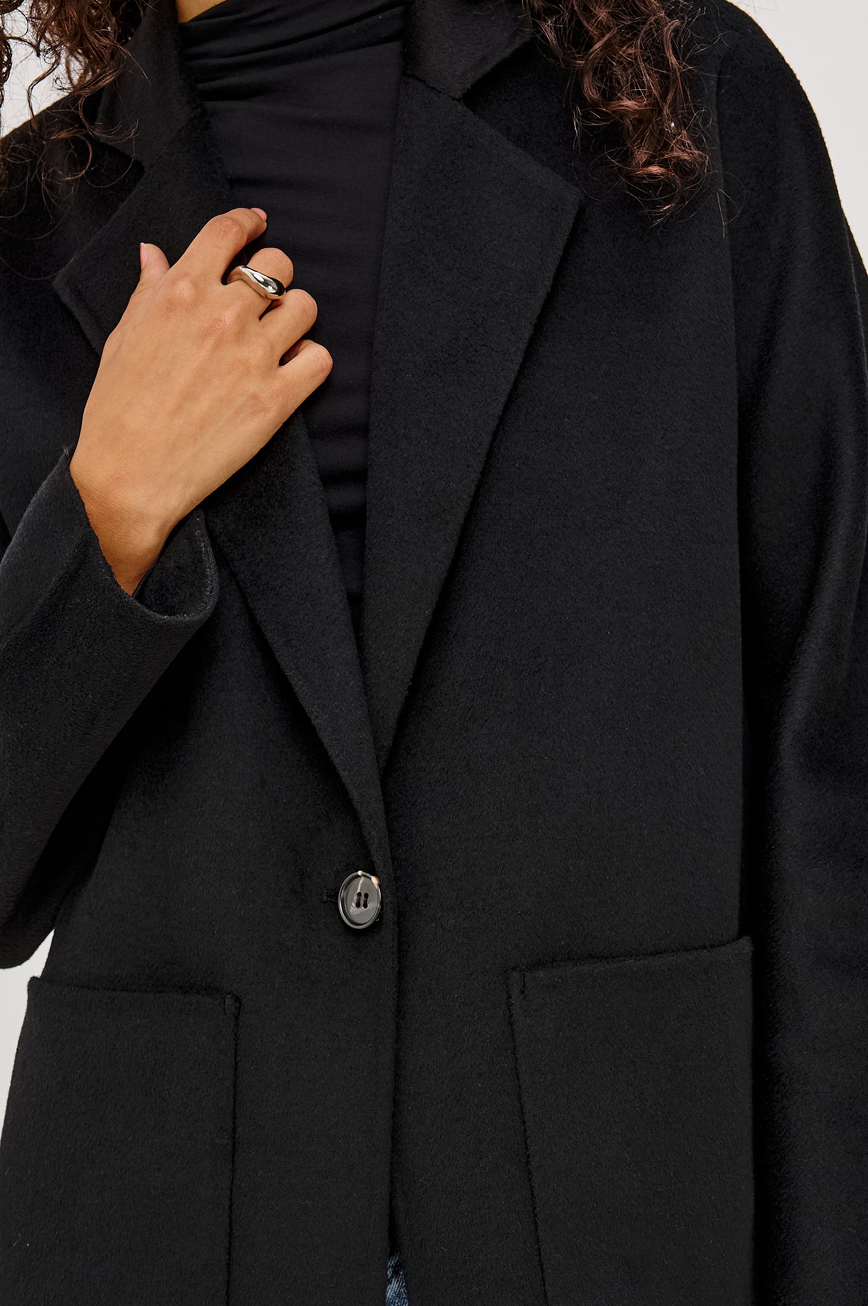 Everest Coat in Heavy Wool Blend With Longline Cut, Slightly Oversized Relaxed Fit, Lapel Collar, Single-Button Front, and Front Patch Pockets in Oat Camel Colorway - Upper Body Front View Featured on Model