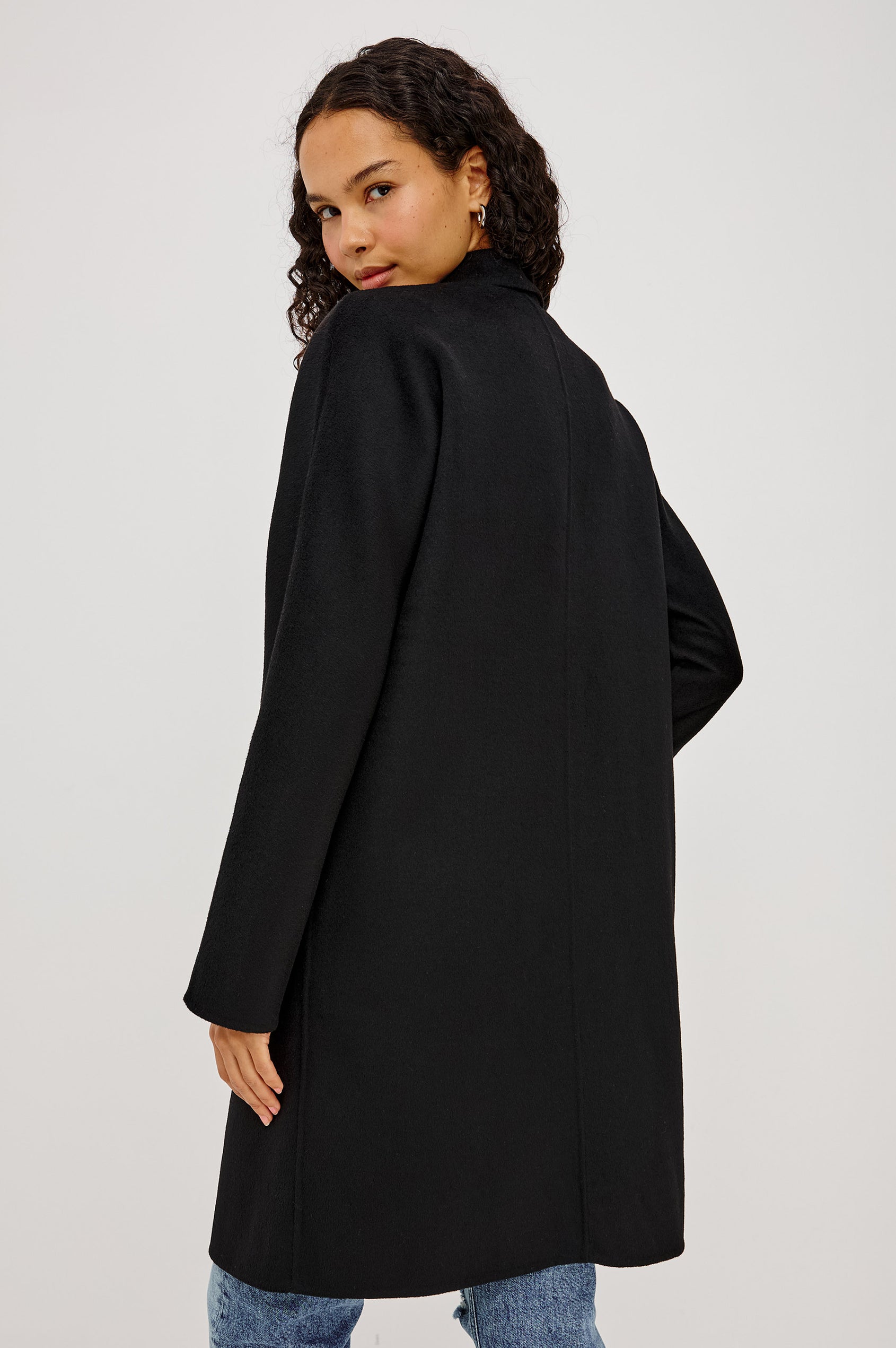 Everest Coat in Heavy Wool Blend With Longline Cut, Slightly Oversized Relaxed Fit, Lapel Collar, Single-Button Front, and Front Patch Pockets in Oat Camel Colorway - Upper Body Back View Featured on Model