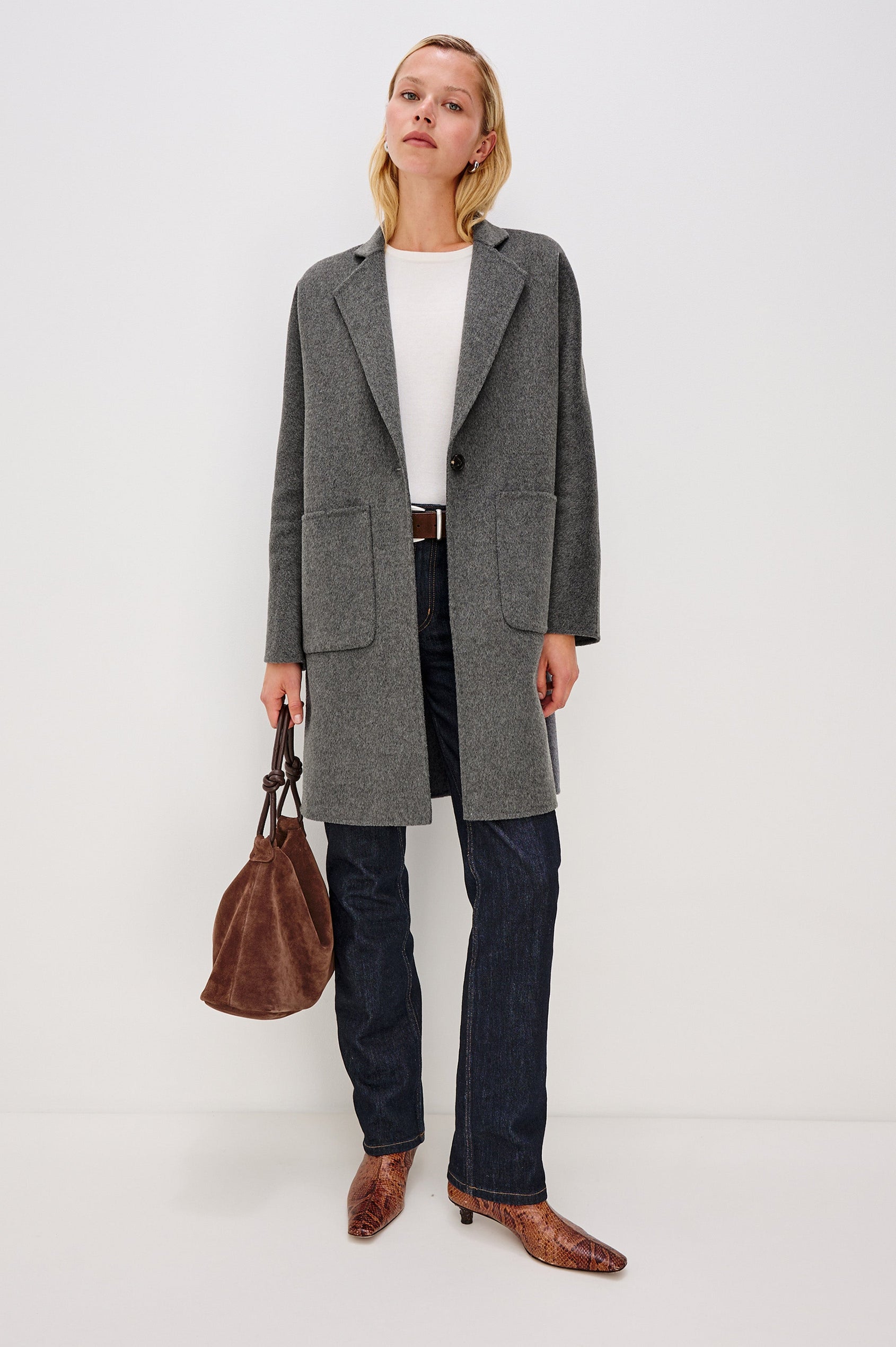Everest Mid-Thigh Length Coat with Single Button Closure, Notched Lapels and Front Patch Pockets in Charcoal Colorway - Front Full Body View Featured on Model