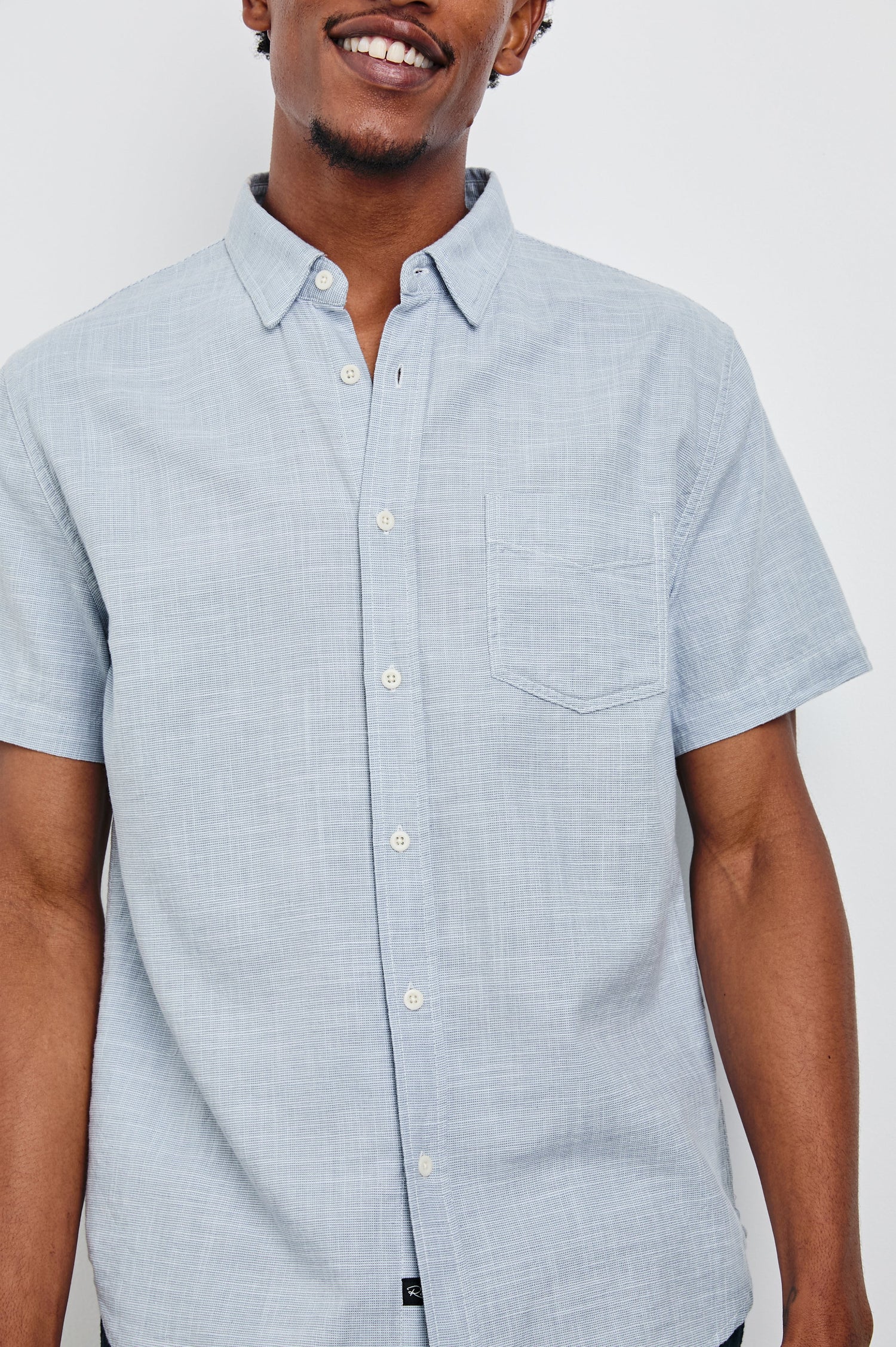 Fairfax Short-Sleeve Button Up with a Chest Patch Pocket in Tidal Etch Colorway - Front View Featured on Model