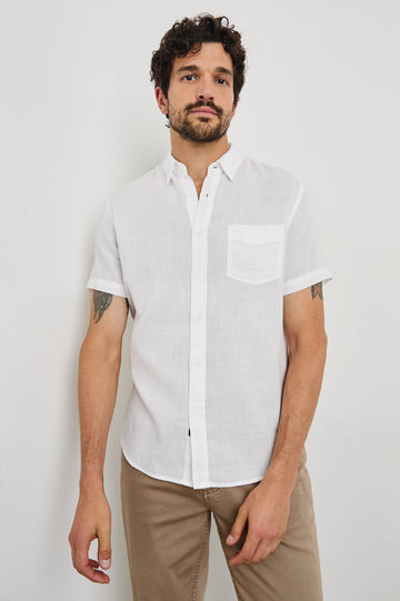 Fairfax short sleeve button up shirt with collar and chest pocket in White - front view on model