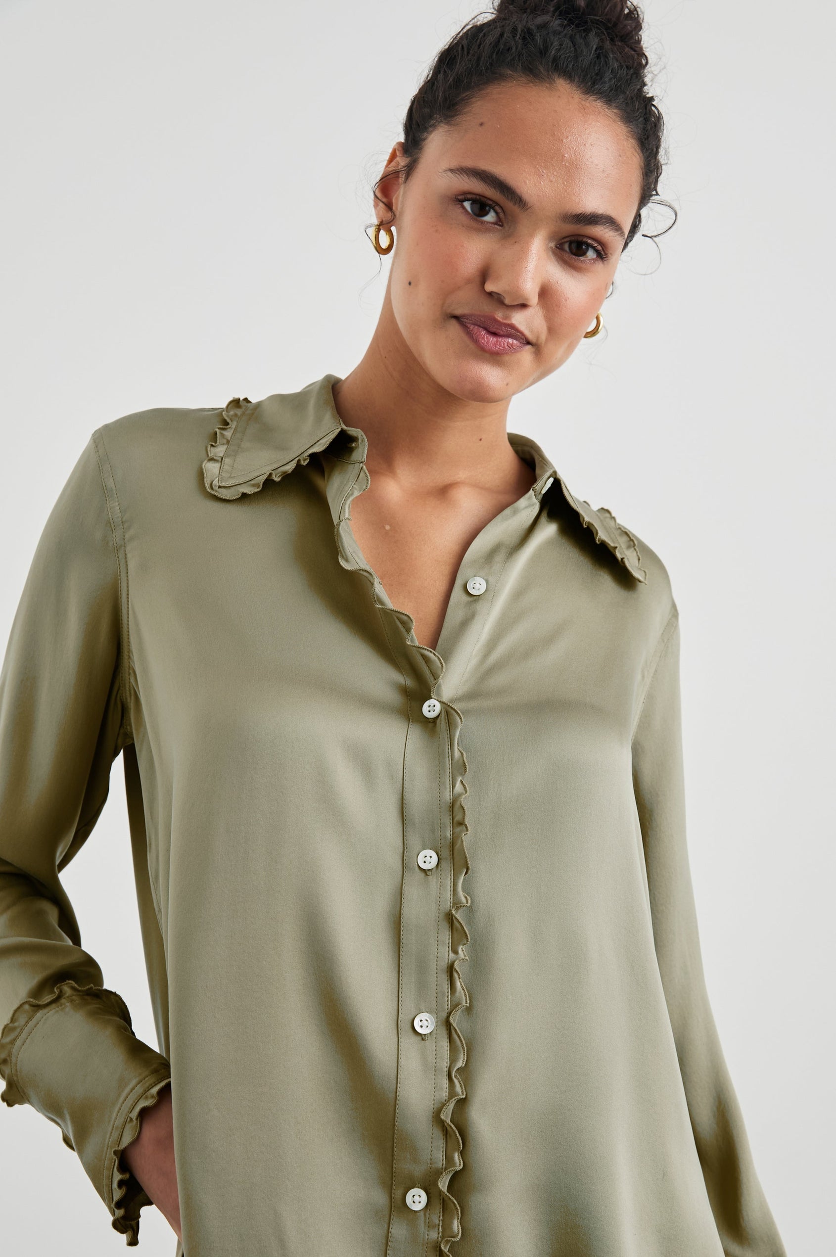 Fia Long-Sleeve Button Up with Lettuce Edges on the Collar, Cuffs, and Closure in Mermaid Colorway - Front View Featured on Model 
