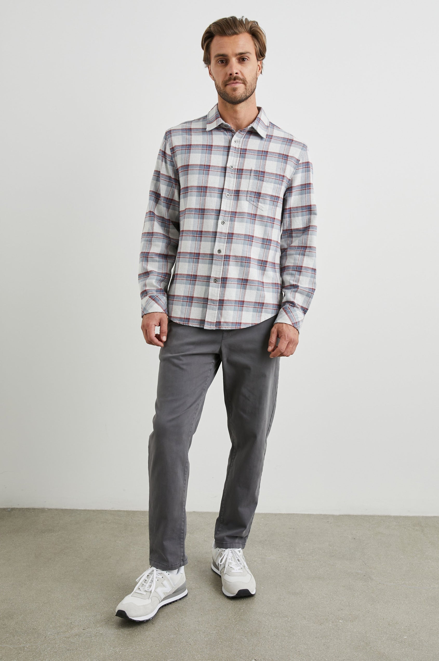 Forrest Long-Sleeve Button Up with a Chest Patch Pocket in Moab Sky Melange Colorway, a plaid in Cream, Blue and Maroon - Front Full Body View Featured on Model