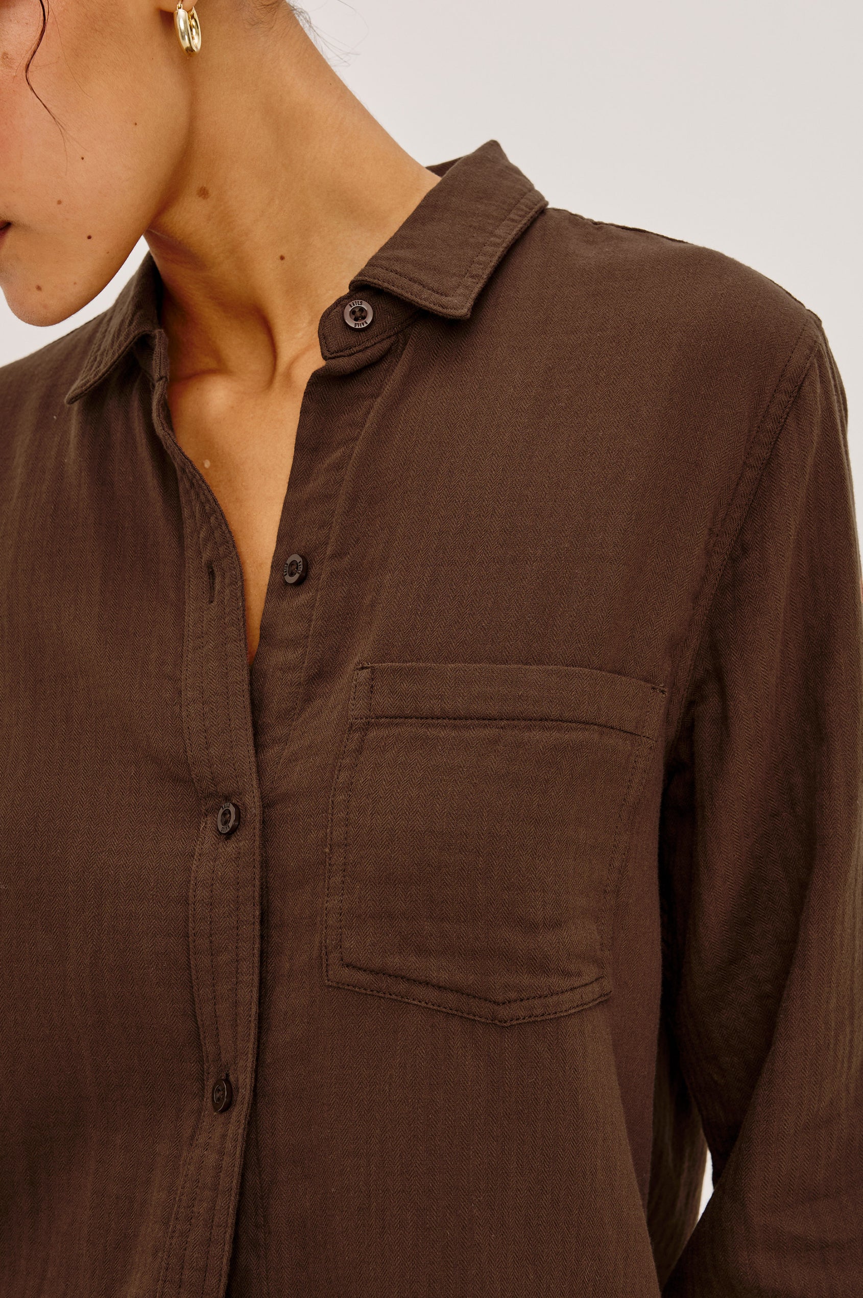 Freeman Button-Up Shirt With Collar, Subtle Herringbone Texture, Relaxed FIt, Chest Patch Pockets, and Long Sleeves in Espresso Colorway - Upper Body Front View Featured on Model