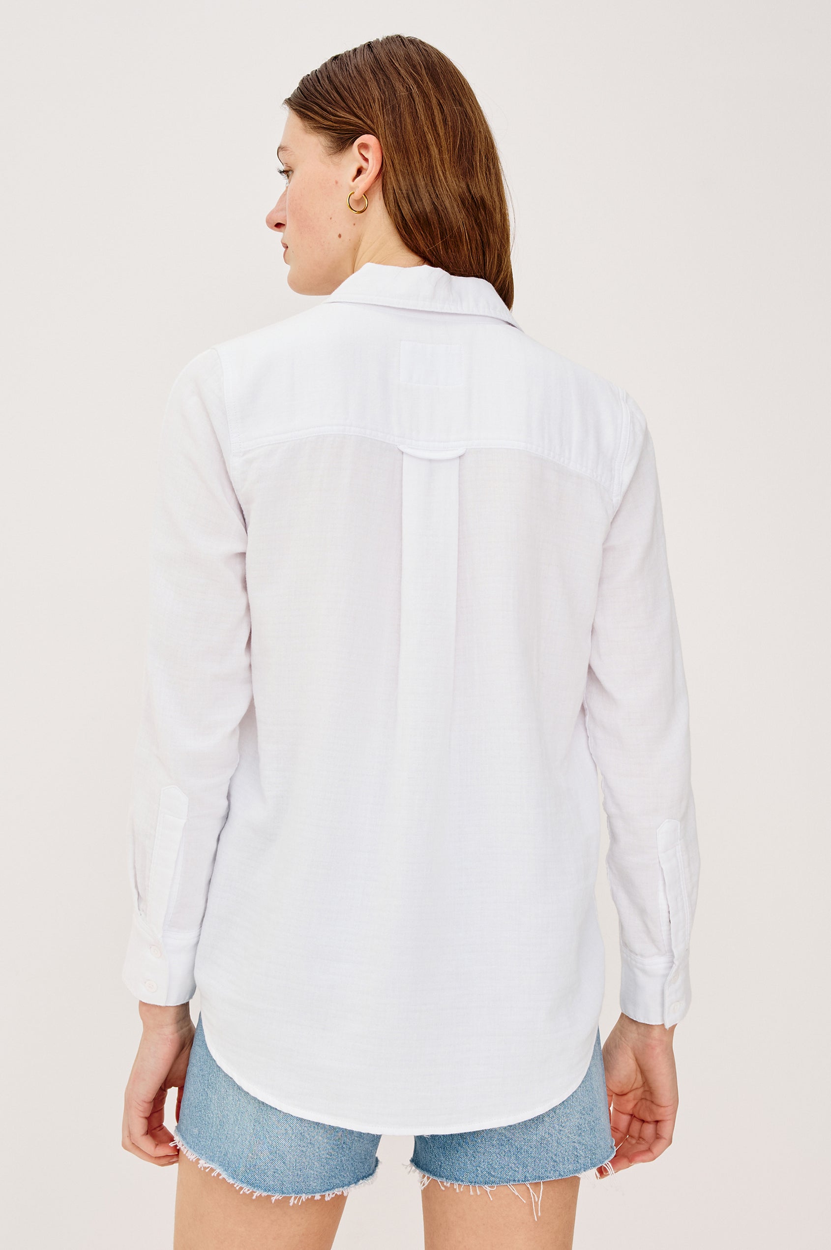 Freeman Button-Up Collared Shirt With Subtle Herringbone Texture Relaxed FIt Chest Patch Pockets and Long Sleeves in White Colorway - Upper Body Back View Featured on Model