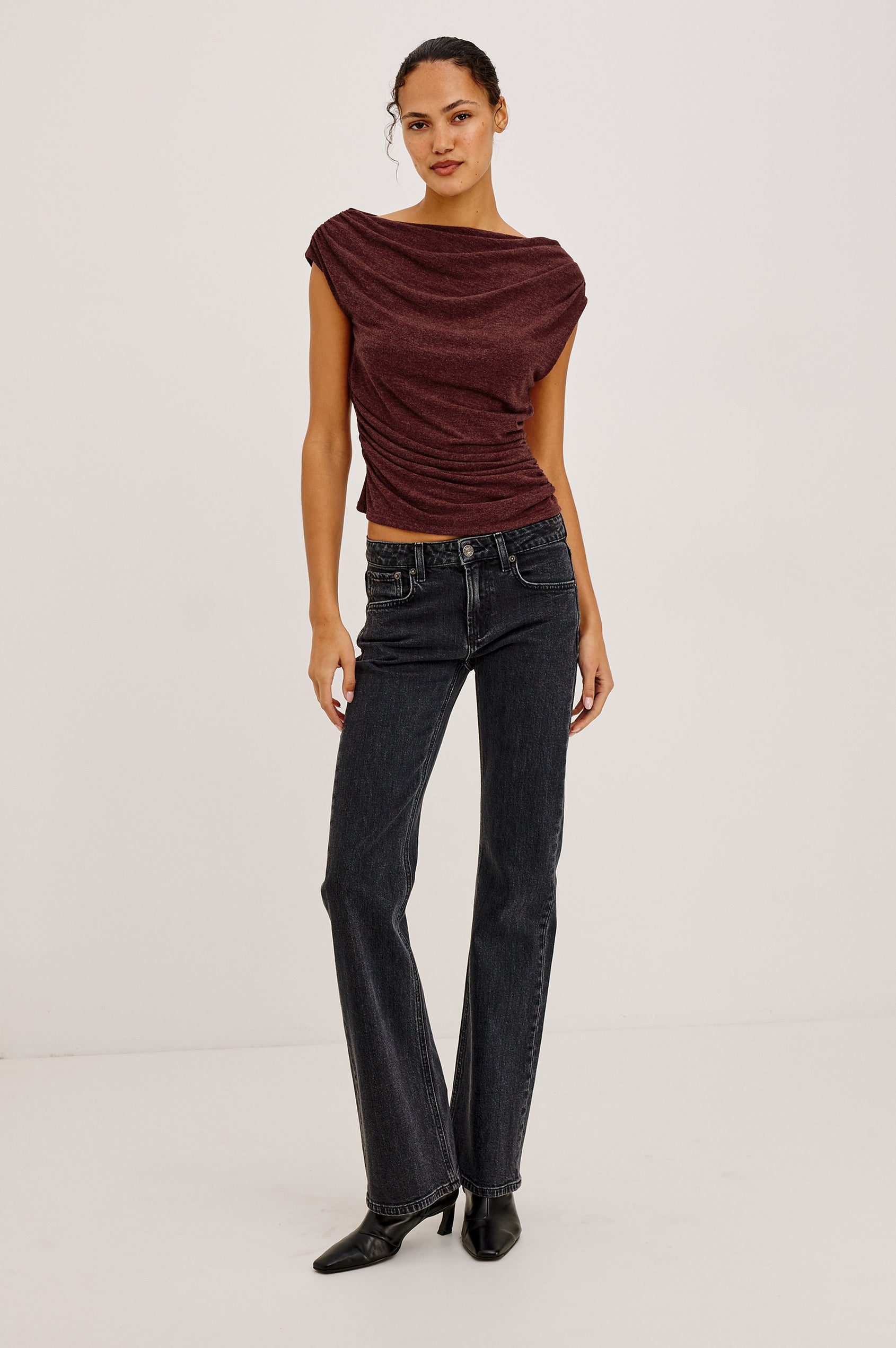 Fremont Low Rise Bootcut Jean in Light Stretch Denim With Extended Inseam, 5-Pockets, Belt Loops, and Zip-Fly Closure in Blackjack Colorway - Full Body Front View Featured on Model
